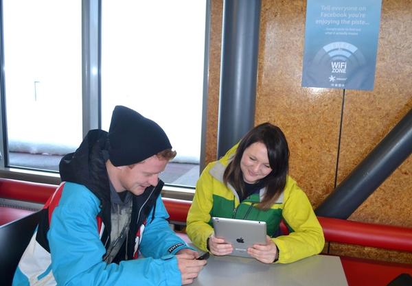Alan Pitfield and Narelle Dancey use the free WiFi at Coronet Peak &#8211; Photo credit Morgan McFie  